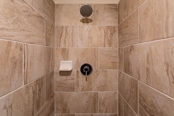 Upgraded bathroom fixtures & tiled showers